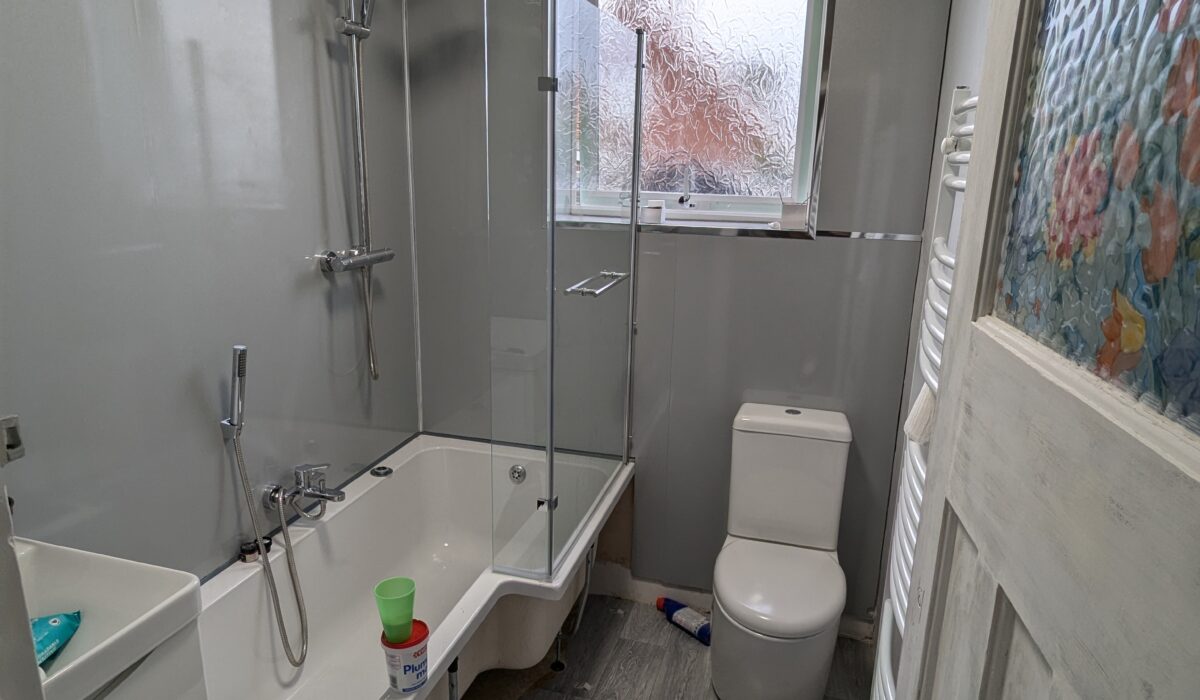 Shower screen fitted in place, a leak from budget B&Q bath fittings was resolved