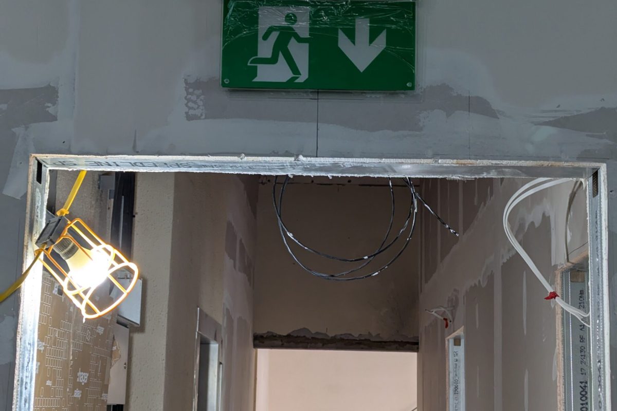 Example of running man, self contained emergency lighting