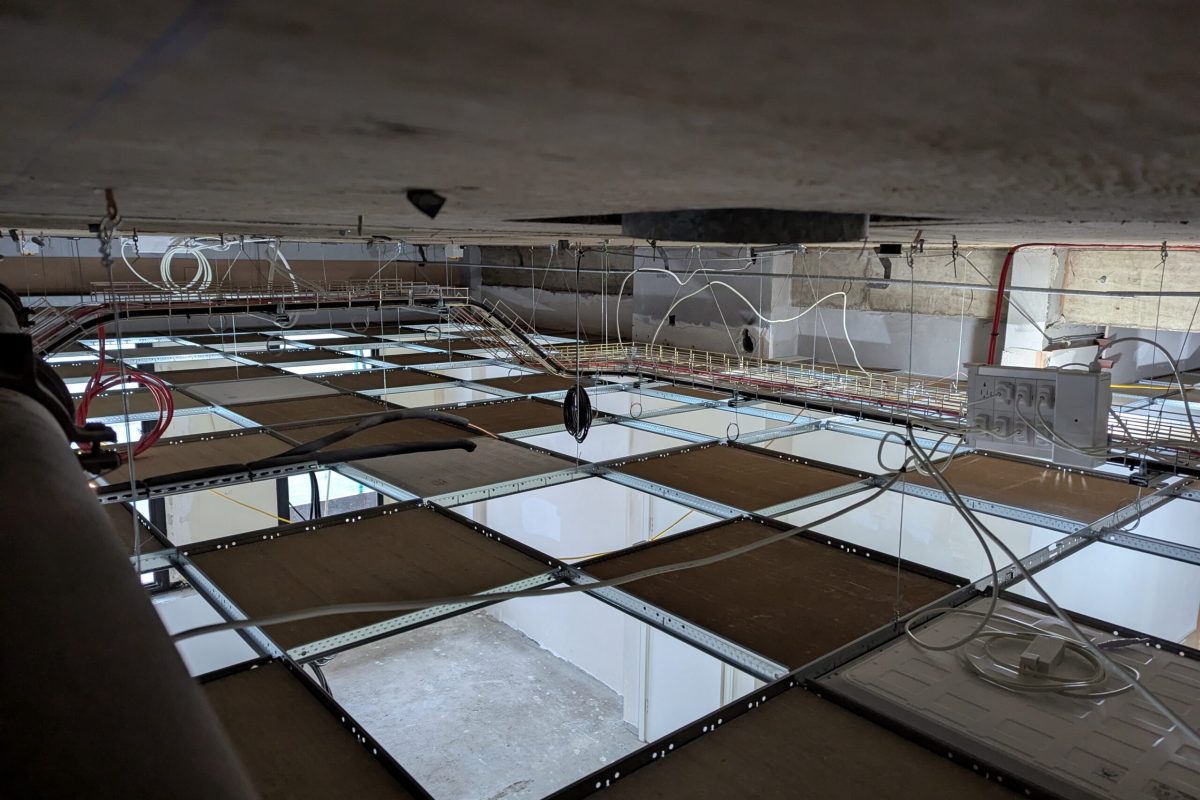 Above ceiling view of containment and lighting distribution