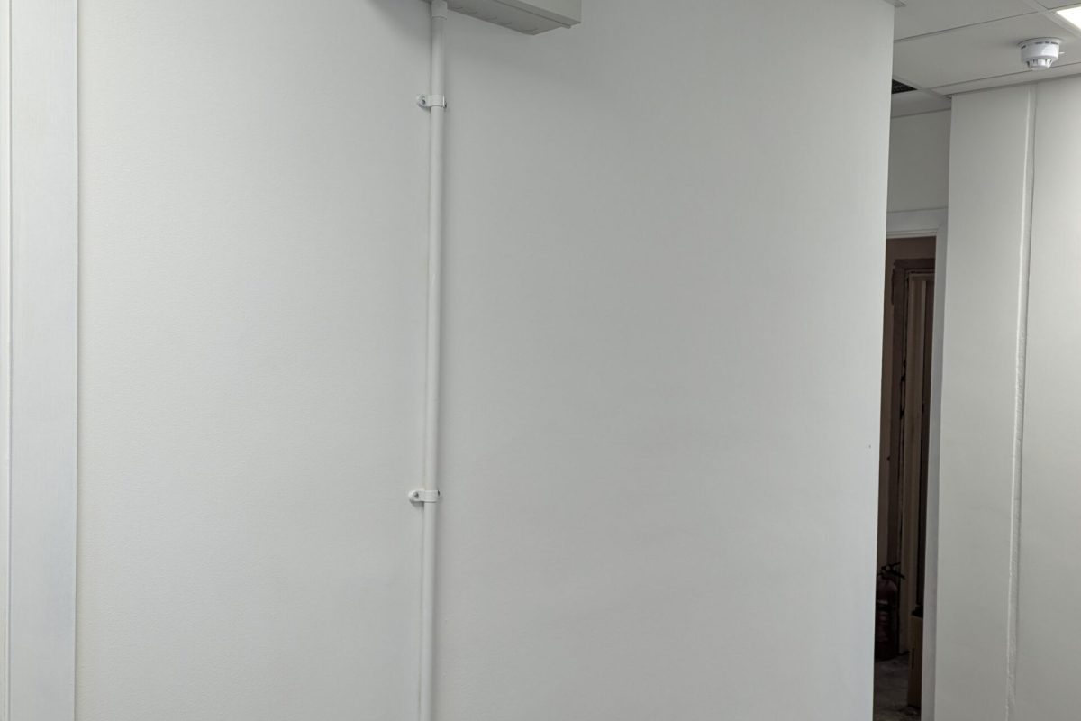 High level distribution board with conduit to cleaners socket